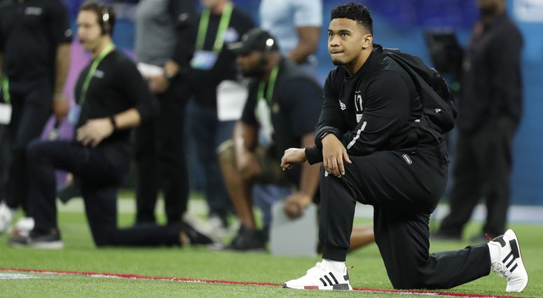 Feb 27, 2020; Indianapolis, Indiana, USA; Alabama Crimson Tide quarterback Tua Tagovailoa (QB17) watches the workouts during the 2020 NFL Combine at Lucas Oil Stadium. Mandatory Credit: Brian Spurlock-USA TODAY Sports Feb 27, 2020; Indianapolis, Indiana, USA; Alabama Crimson Tide quarterback Tua Tagovailoa (QB17) watches the workouts during the 2020 NFL Combine at Lucas Oil Stadium. Mandatory Credit: Brian Spurlock-USA TODAY Sports
