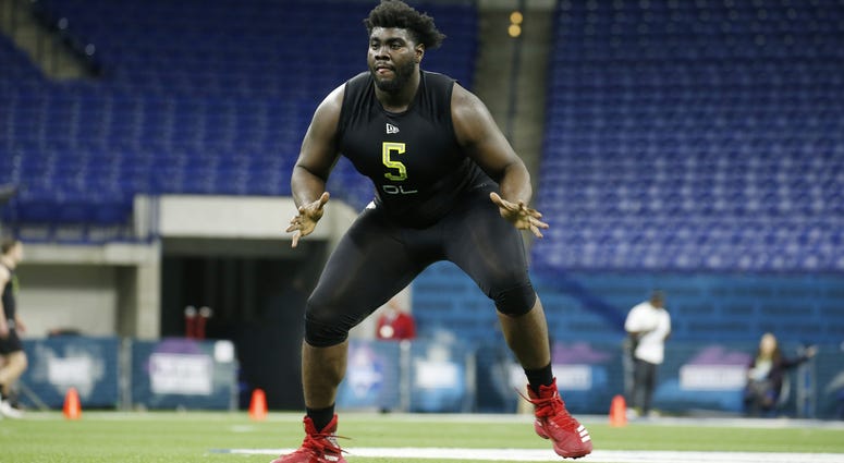Feb 28, 2020; Indianapolis, Indiana, USA; Louisville Cardinals offensive lineman Mekhi Becton (OL05) goes through workout drills during the 2020 NFL Combine at Lucas Oil Stadium. Mandatory Credit: Brian Spurlock-USA TODAY Sports Feb 28, 2020; Indianapolis, Indiana, USA; Louisville Cardinals offensive lineman Mekhi Becton (OL05) goes through workout drills during the 2020 NFL Combine at Lucas Oil Stadium. Mandatory Credit: Brian Spurlock-USA TODAY Sports