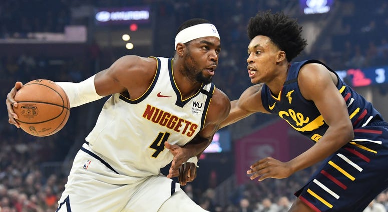 Mar 7, 2020; Cleveland, Ohio, USA; Denver Nuggets forward Paul Millsap (4) drives to the basket against Cleveland Cavaliers guard Collin Sexton (2) during the first half at Rocket Mortgage FieldHouse. Mandatory Credit: Ken Blaze-USA TODAY Sports Mar 7, 2020; Cleveland, Ohio, USA; Denver Nuggets forward Paul Millsap (4) drives to the basket against Cleveland Cavaliers guard Collin Sexton (2) during the first half at Rocket Mortgage FieldHouse. Mandatory Credit: Ken Blaze-USA TODAY Sports