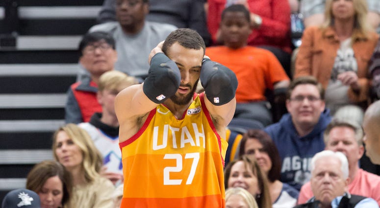 Utah Jazz center Rudy Gobert (27) reacts to a call during the second half against the Toronto Raptors at Vivint Smart Home Arena. Utah Jazz center Rudy Gobert (27) reacts to a call during the second half against the Toronto Raptors at Vivint Smart Home Arena.
