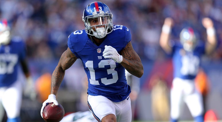 Nov 6, 2016; East Rutherford, NJ, USA; New York Giants wide receiver Odell Beckham Jr. (13) runs for a touchdown against the Philadelphia Eagles during the first quarter at MetLife Stadium. Mandatory Credit: Brad Penner-USA TODAY Sports Nov 6, 2016; East Rutherford, NJ, USA; New York Giants wide receiver Odell Beckham Jr. (13) runs for a touchdown against the Philadelphia Eagles during the first quarter at MetLife Stadium. Mandatory Credit: Brad Penner-USA TODAY Sports