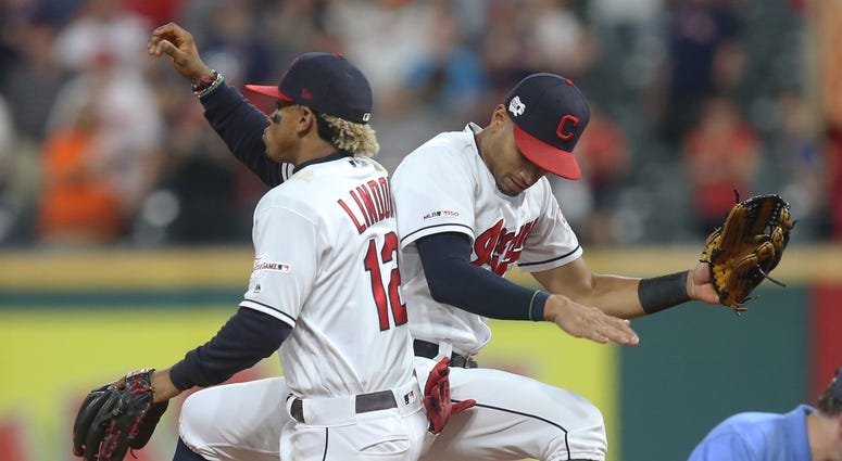 Indians shortstop Francisco Lindor and center fielder Oscar Mercado