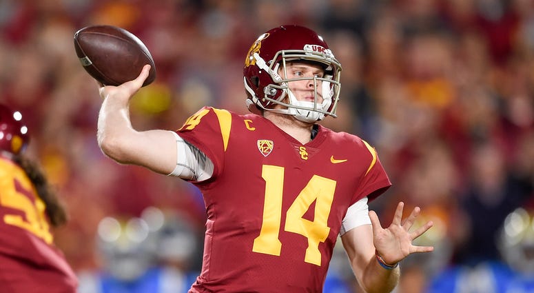 Southern California Trojans quarterback Sam Darnold (14) throws the ball during the first half against the UCLA Bruins at Los Angeles Memorial Coliseum. Sam Darnold vs. UCLA