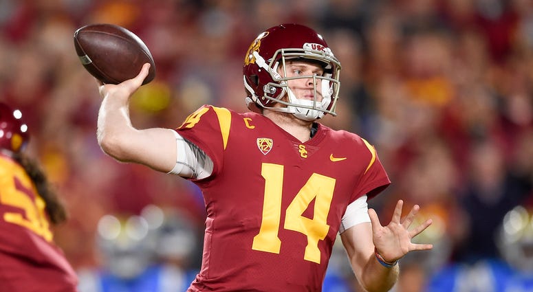 Southern California Trojans quarterback Sam Darnold (14) throws the ball during the first half against the UCLA Bruins at Los Angeles Memorial Coliseum. Sam Darnold vs. UCLA