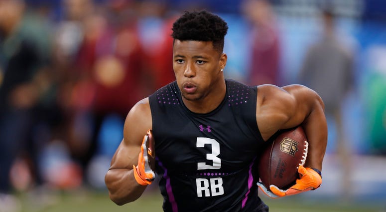 Mar 2, 2018; Indianapolis, IN, USA; Penn State Nittany Lions Saquon Barkley running back goes through workout drills during the 2018 NFL Combine at Lucas Oil Stadium. Mandatory Credit: Brian Spurlock-USA TODAY Sports