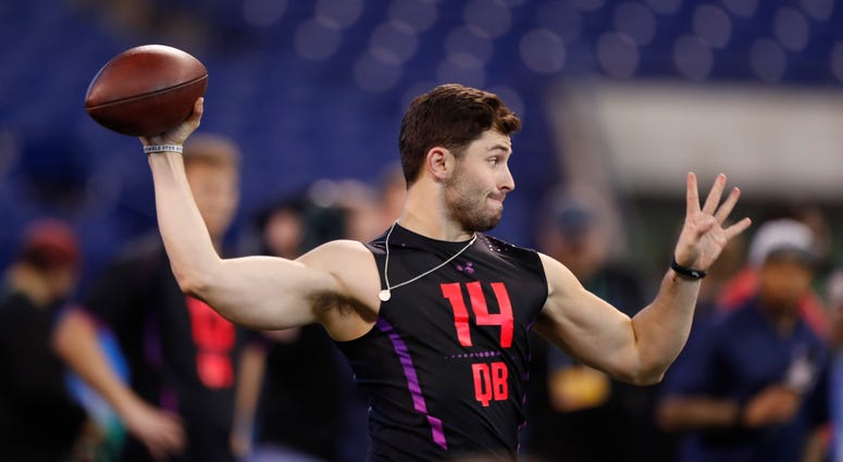 Mar 3, 2018; Indianapolis, IN, USA; Oklahoma Sooners quarterback Baker Mayfield throws a pass during the 2018 NFL Combine at Lucas Oil Stadium. Mandatory Credit: Brian Spurlock-USA TODAY Sports