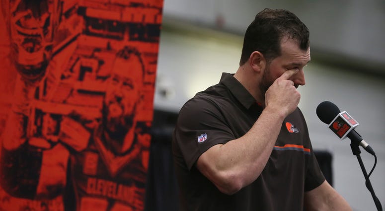 Cleveland Browns offensive tackle Joe Thomas wipes away a tear after learning the beat writers renamed the player of the year award the Joe Thomas award during his retirement press conference at the Cleveland Browns training facility on Monday, March 19, Cleveland Browns offensive tackle Joe Thomas wipes away a tear after learning the beat writers renamed the player of the year award the Joe Thomas award during his retirement press conference at the Cleveland Browns training facility on Monday, March 19,