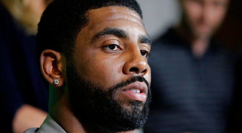 Boston Celtics' Kyrie Irving takes questions from reporters during a news conference in Boston. Boston Celtics' Kyrie Irving takes questions from reporters during a news conference in Boston.