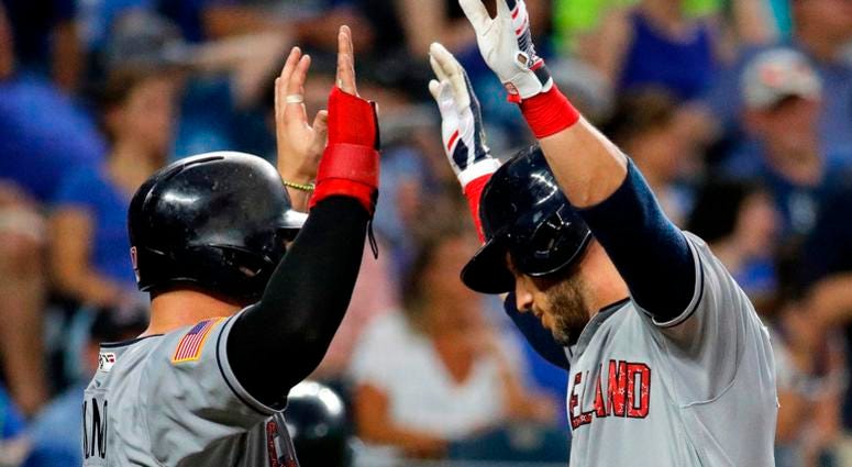 Cleveland Indians' Yan Gomes, right, celebrates with Yonder Alonso after Gomes hit a grand slam during the sixth inning of a baseball game against the Kansas City Royals on Tuesday, July 3, 2018, in Kansas City, Mo. Cleveland Indians' Yan Gomes, right, celebrates with Yonder Alonso after Gomes hit a grand slam during the sixth inning of a baseball game against the Kansas City Royals on Tuesday, July 3, 2018, in Kansas City, Mo.