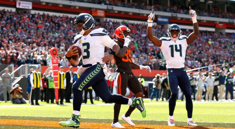 CLEVELAND, OH - OCTOBER 13: Russell Wilson #3 of the Seattle Seahawks scores a touchdown during the first quarter of the game against the Cleveland Browns at FirstEnergy Stadium on October 13, 2019 in Cleveland, Ohio. (Photo by Kirk Irwin/Getty Images) CLEVELAND, OH - OCTOBER 13: Russell Wilson #3 of the Seattle Seahawks scores a touchdown during the first quarter of the game against the Cleveland Browns at FirstEnergy Stadium on October 13, 2019 in Cleveland, Ohio. (Photo by Kirk Irwin/Getty Images)
