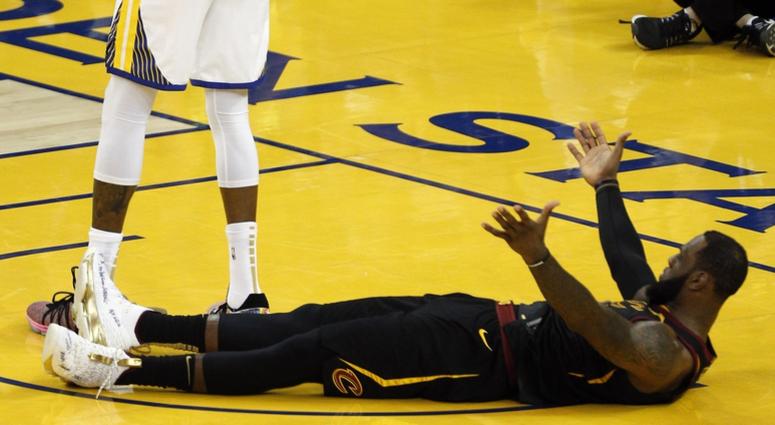 LeBron James (23) reacts after Golden State Warriors forward Kevin Durant (35) collides with him during the second half in game one of the 2018 NBA Finals at Oracle Arena. LeBron James (23) reacts after Golden State Warriors forward Kevin Durant (35) collides with him during the second half in game one of the 2018 NBA Finals at Oracle Arena.