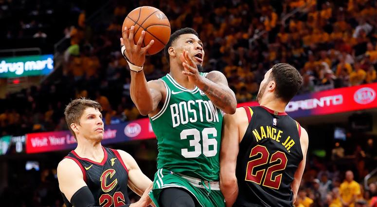 May 19, 2018; Cleveland, OH, USA; Boston Celtics guard Marcus Smart (36) drives to the basket in between Cleveland Cavaliers forward Larry Nance Jr. (22) and guard Kyle Korver (26) during the second half in game three of the Eastern conference finals of t May 19, 2018; Cleveland, OH, USA; Boston Celtics guard Marcus Smart (36) drives to the basket in between Cleveland Cavaliers forward Larry Nance Jr. (22) and guard Kyle Korver (26) during the second half in game three of the Eastern conference finals of t