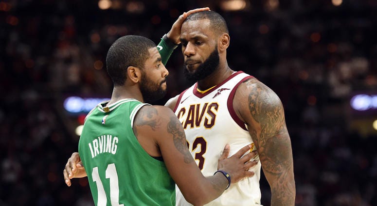 Oct 17, 2017; Cleveland, OH, USA; Cleveland Cavaliers forward LeBron James (23) and Boston Celtics guard Kyrie Irving (11) meet after the Cavs beat the Celtics 102-99 at Quicken Loans Arena. Mandatory Credit: Ken Blaze-USA TODAY Sports Oct 17, 2017; Cleveland, OH, USA; Cleveland Cavaliers forward LeBron James (23) and Boston Celtics guard Kyrie Irving (11) meet after the Cavs beat the Celtics 102-99 at Quicken Loans Arena. Mandatory Credit: Ken Blaze-USA TODAY Sports