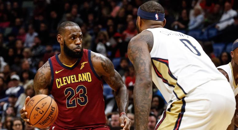 Cleveland Cavaliers forward LeBron James (23) is defended by New Orleans Pelicans forward DeMarcus Cousins (0) during the first half of a game at the Smoothie King Center. Cleveland Cavaliers forward LeBron James (23) is defended by New Orleans Pelicans forward DeMarcus Cousins (0) during the first half of a game at the Smoothie King Center.