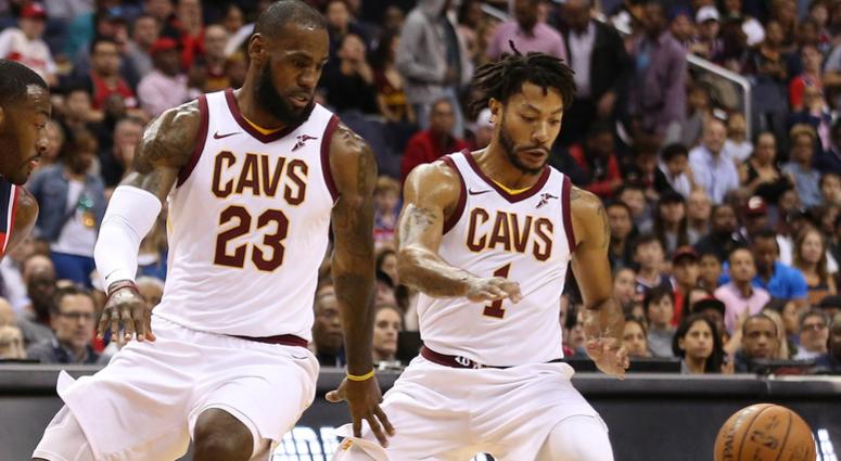 Nov 3, 2017; Washington, DC, USA; Cleveland Cavaliers forward LeBron James (23) and Cavaliers guard Derrick Rose (1) reach for a loose ball against the Washington Wizards at Capital One Arena. Mandatory Credit: Geoff Burke-USA TODAY Sports Nov 3, 2017; Washington, DC, USA; Cleveland Cavaliers forward LeBron James (23) and Cavaliers guard Derrick Rose (1) reach for a loose ball against the Washington Wizards at Capital One Arena. Mandatory Credit: Geoff Burke-USA TODAY Sports