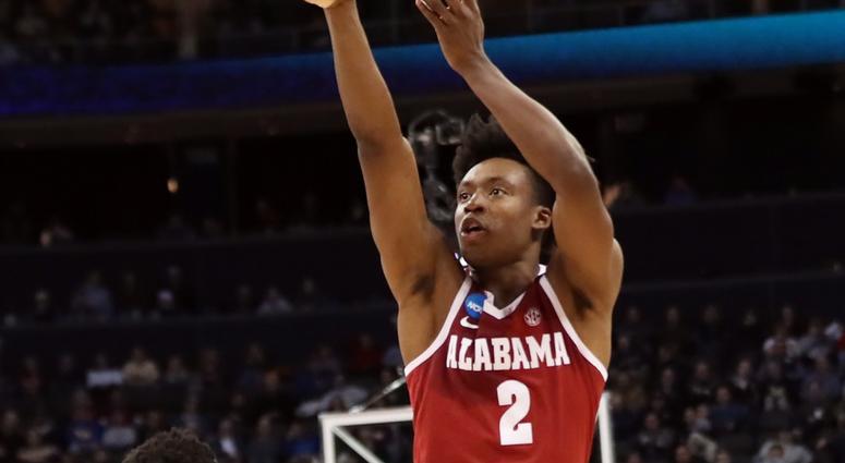 Alabama Crimson Tide guard Collin Sexton (2) shoots over Virginia Tech Hokies guard Justin Robinson (5) during the second half in the first round of the 2018 NCAA Tournament at PPG Paints Arena Alabama Crimson Tide guard Collin Sexton (2) shoots over Virginia Tech Hokies guard Justin Robinson (5) during the second half in the first round of the 2018 NCAA Tournament at PPG Paints Arena