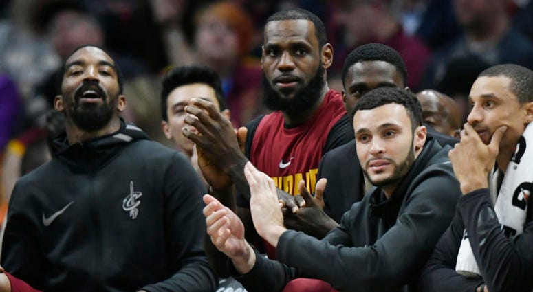 Apr 11, 2018; Cleveland, OH, USA; Cleveland Cavaliers forward LeBron James (center) sits on the bench in the fourth quarter against the New York Knicks at Quicken Loans Arena. Apr 11, 2018; Cleveland, OH, USA; Cleveland Cavaliers forward LeBron James (center) sits on the bench in the fourth quarter against the New York Knicks at Quicken Loans Arena.