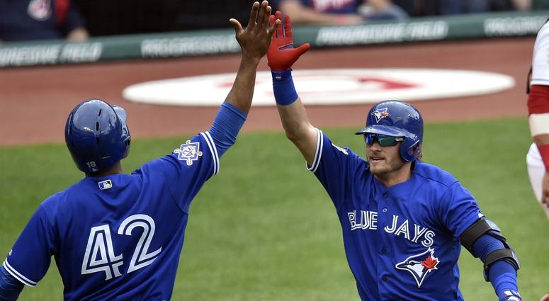 Toronto Blue Jays third baseman Josh Donaldson (20) celebrates his solo home run in the sixth inning against the Cleveland Indians at Progressive Field. Toronto Blue Jays third baseman Josh Donaldson (20) celebrates his solo home run in the sixth inning against the Cleveland Indians at Progressive Field.