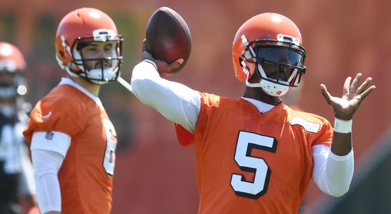 Browns quarterback Baker Mayfield (6) watches as quarterback Tyrod Taylor (5) throws a pass during organized team activities at the Cleveland Browns training facility. Browns quarterback Baker Mayfield (6) watches as quarterback Tyrod Taylor (5) throws a pass during organized team activities at the Cleveland Browns training facility.