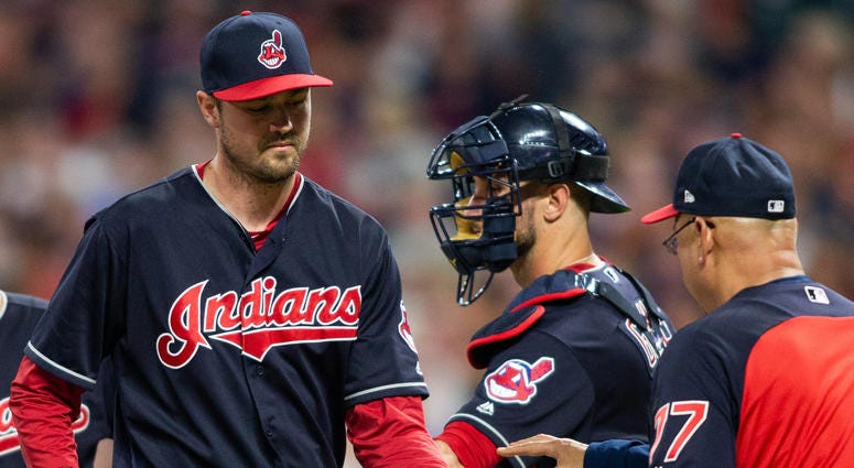 May 25, 2018; Cleveland, OH, USA; Cleveland Indians pitcher Andrew Miller, (left), gives the ball to Cleveland Indians manager Terry Francona after giving up a two run hit to the Houston Astros during the eighth inning at Progressive Field. May 25, 2018; Cleveland, OH, USA; Cleveland Indians pitcher Andrew Miller, (left), gives the ball to Cleveland Indians manager Terry Francona after giving up a two run hit to the Houston Astros during the eighth inning at Progressive Field.