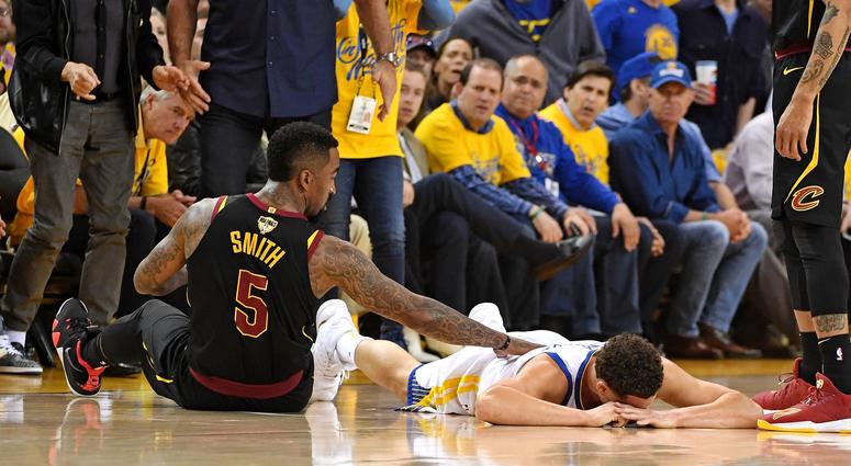 Golden State Warriors guard Klay Thompson (11) reacts after an apparent injury during the first quarter against Cleveland Cavaliers guard JR Smith (5) in game one of the 2018 NBA Finals Golden State Warriors guard Klay Thompson (11) reacts after an apparent injury during the first quarter against Cleveland Cavaliers guard JR Smith (5) in game one of the 2018 NBA Finals