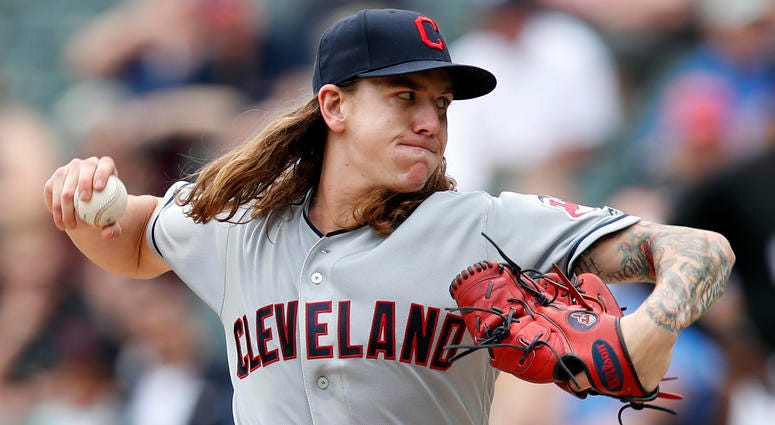 Jun 14, 2018; Chicago, IL, USA; Cleveland Indians starting pitcher Mike Clevinger (52) pitches against the Chicago White Sox during the first inning at Guaranteed Rate Field. Jun 14, 2018; Chicago, IL, USA; Cleveland Indians starting pitcher Mike Clevinger (52) pitches against the Chicago White Sox during the first inning at Guaranteed Rate Field.