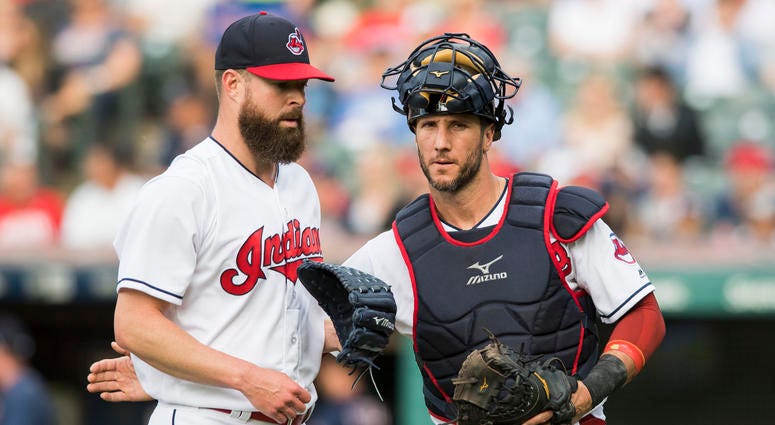 Jun 15, 2018; Cleveland, OH, USA; Cleveland Indians catcher Yan Gomes (7) talks with starting pitcher Corey Kluber (28) as they leave the field during the first inning against the Minnesota Twins at Progressive Field. Jun 15, 2018; Cleveland, OH, USA; Cleveland Indians catcher Yan Gomes (7) talks with starting pitcher Corey Kluber (28) as they leave the field during the first inning against the Minnesota Twins at Progressive Field.