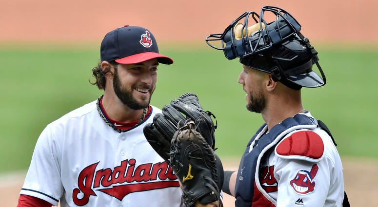 Jun 20, 2018; Cleveland, OH, USA; Cleveland Indians relief pitcher George Kontos (70) reacts with catcher Yan Gomes (7) in the eighth inning against the Chicago White Sox at Progressive Field. Jun 20, 2018; Cleveland, OH, USA; Cleveland Indians relief pitcher George Kontos (70) reacts with catcher Yan Gomes (7) in the eighth inning against the Chicago White Sox at Progressive Field.