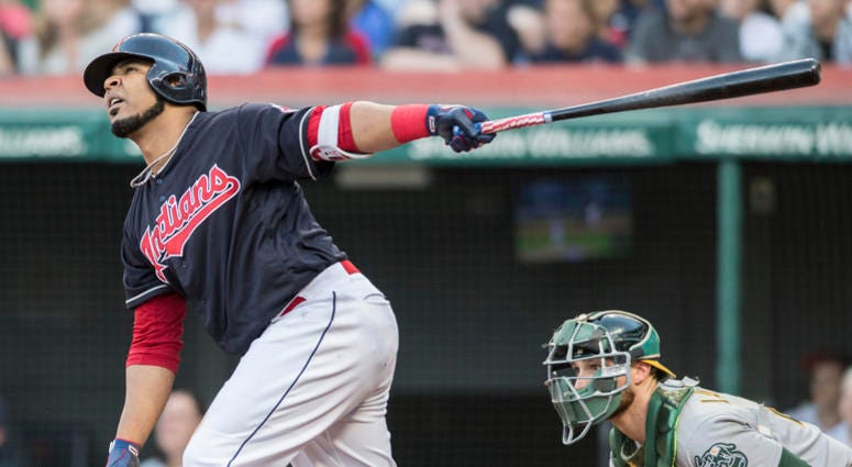 Jul 6, 2018; Cleveland, OH, USA; Cleveland Indians designated hitter Edwin Encarnacion (10) hits a sacrifice fly during the third inning against the Oakland Athletics at Progressive Field. Jul 6, 2018; Cleveland, OH, USA; Cleveland Indians designated hitter Edwin Encarnacion (10) hits a sacrifice fly during the third inning against the Oakland Athletics at Progressive Field.