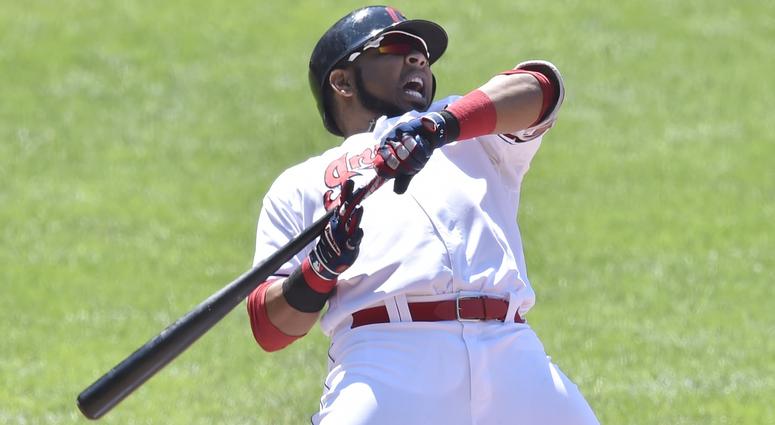 Cleveland Indians designated hitter Edwin Encarnacion (10) reacts after an inside pitch in the eighth inning against the Pittsburgh Pirates at Progressive Field. Cleveland Indians designated hitter Edwin Encarnacion (10) reacts after an inside pitch in the eighth inning against the Pittsburgh Pirates at Progressive Field.