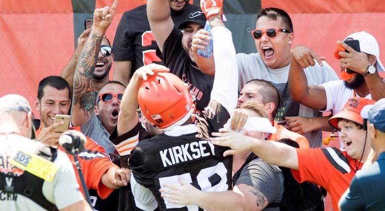 Fans greet Cleveland Browns linebacker Christian Kirksey (58) during training camp at the Cleveland Browns Training Complex. Fans greet Cleveland Browns linebacker Christian Kirksey (58) during training camp at the Cleveland Browns Training Complex.