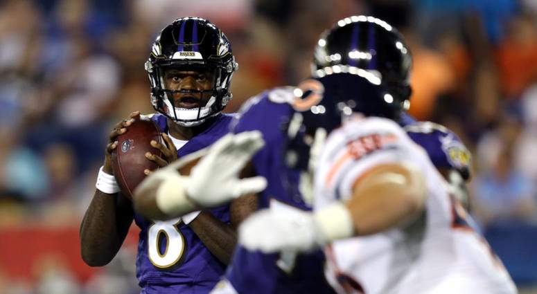 Aug 2, 2018; Canton, OH, USA; Baltimore Ravens quarterback Lamar Jackson (8) looks to pass against the Chicago Bears in the second half at Tom Benson Hall of Fame Stadium. Mandatory Credit: Aaron Doster-USA TODAY Sports Aug 2, 2018; Canton, OH, USA; Baltimore Ravens quarterback Lamar Jackson (8) looks to pass against the Chicago Bears in the second half at Tom Benson Hall of Fame Stadium. Mandatory Credit: Aaron Doster-USA TODAY Sports