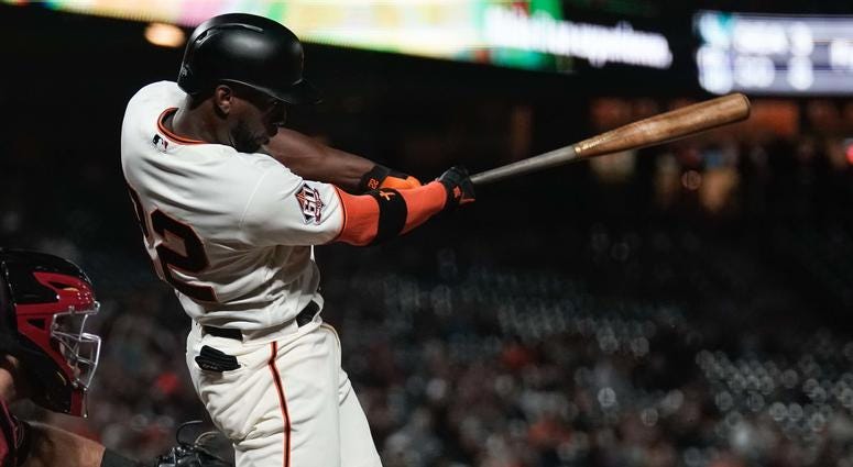 Aug 29, 2018; San Francisco, CA, USA; San Francisco Giants center fielder Andrew McCutchen (22) hits a RBI single against the Arizona Diamondbacks during the eighth inning at AT&T Park. Aug 29, 2018; San Francisco, CA, USA; San Francisco Giants center fielder Andrew McCutchen (22) hits a RBI single against the Arizona Diamondbacks during the eighth inning at AT&T Park.