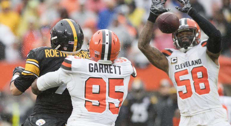 Cleveland Browns defensive end Myles Garrett (95) forces a fumble from Pittsburgh Steelers quarterback Ben Roethlisberger (7) as linebacker Christian Kirksey (58) goes for the ball during the second half at FirstEnergy Stadium. Cleveland Browns defensive end Myles Garrett (95) forces a fumble from Pittsburgh Steelers quarterback Ben Roethlisberger (7) as linebacker Christian Kirksey (58) goes for the ball during the second half at FirstEnergy Stadium.