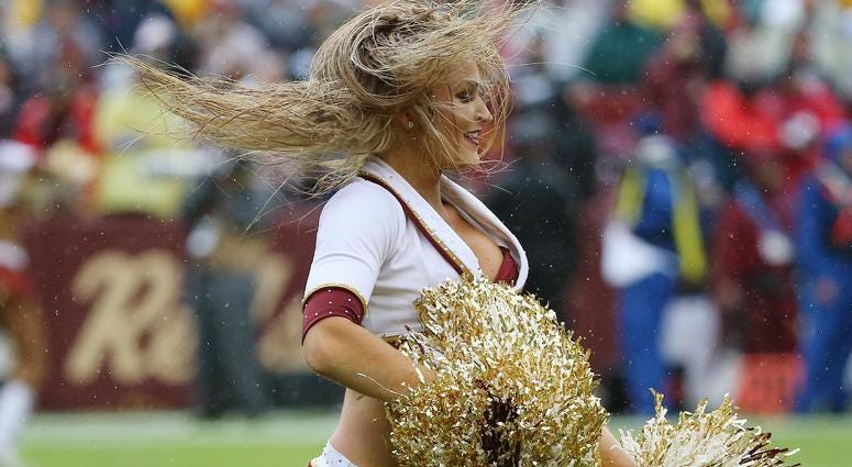 Sep 23, 2018; Landover, MD, USA; A Washington Redskins cheerleader dances on the field during a timeout against the Green Bay Packers in the first quarter at FedEx Field. The Redskins won 31-17. Mandatory Credit: Geoff Burke-USA TODAY Sports Sep 23, 2018; Landover, MD, USA; A Washington Redskins cheerleader dances on the field during a timeout against the Green Bay Packers in the first quarter at FedEx Field. The Redskins won 31-17. Mandatory Credit: Geoff Burke-USA TODAY Sports