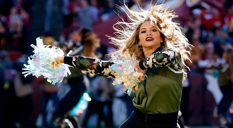 Nov 4, 2018; Landover, MD, USA; A Washington Redskins cheerleader dances on the field during a timeout against the Atlanta Falcons in the second quarter at FedEx Field. Mandatory Credit: Geoff Burke-USA TODAY Sports Nov 4, 2018; Landover, MD, USA; A Washington Redskins cheerleader dances on the field during a timeout against the Atlanta Falcons in the second quarter at FedEx Field. Mandatory Credit: Geoff Burke-USA TODAY Sports