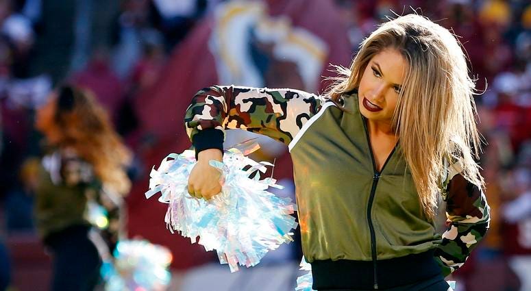 Nov 4, 2018; Landover, MD, USA; A Washington Redskins cheerleader dances on the field during a timeout against the Atlanta Falcons in the second quarter at FedEx Field. Mandatory Credit: Geoff Burke-USA TODAY Sports Nov 4, 2018; Landover, MD, USA; A Washington Redskins cheerleader dances on the field during a timeout against the Atlanta Falcons in the second quarter at FedEx Field. Mandatory Credit: Geoff Burke-USA TODAY Sports