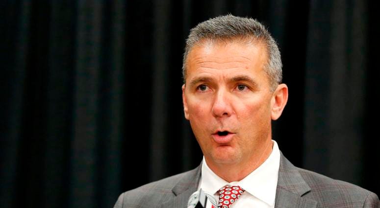 hio State Buckeyes head coach Urban Meyer (left) addresses members of the media to announce his intentions to step down from coaching after the Rose Bowl game. Meyer is pictured with newly named head coach Ryan Day during the press conference at the Ohio hio State Buckeyes head coach Urban Meyer (left) addresses members of the media to announce his intentions to step down from coaching after the Rose Bowl game. Meyer is pictured with newly named head coach Ryan Day during the press conference at the Ohio