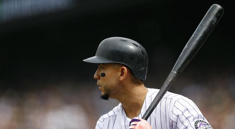 Sep 3, 2018; Denver, CO, USA; Colorado Rockies right fielder Carlos Gonzalez (5) on deck in the first inning against the San Francisco Giants at Coors Field. Mandatory Credit: Isaiah J. Downing-USA TODAY Sports Sep 3, 2018; Denver, CO, USA; Colorado Rockies right fielder Carlos Gonzalez (5) on deck in the first inning against the San Francisco Giants at Coors Field. Mandatory Credit: Isaiah J. Downing-USA TODAY Sports