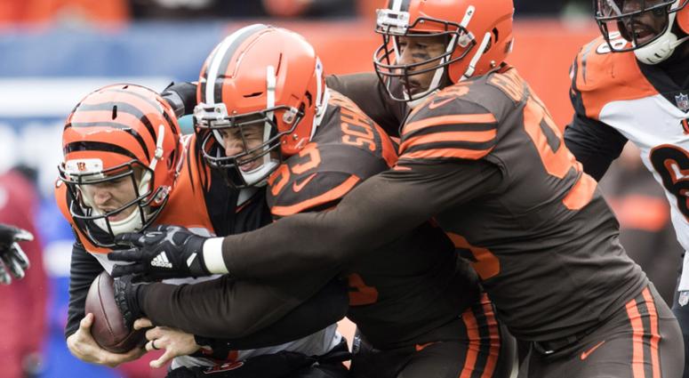 Dec 23, 2018; Cleveland, OH, USA; Cleveland Browns middle linebacker Joe Schobert (53) and defensive end Myles Garrett (95) tackle Cincinnati Bengals quarterback Jeff Driskel (6) during the first quarter at FirstEnergy Stadium. Mandatory Credit: Ken Blaze Dec 23, 2018; Cleveland, OH, USA; Cleveland Browns middle linebacker Joe Schobert (53) and defensive end Myles Garrett (95) tackle Cincinnati Bengals quarterback Jeff Driskel (6) during the first quarter at FirstEnergy Stadium. Mandatory Credit: Ken Blaze