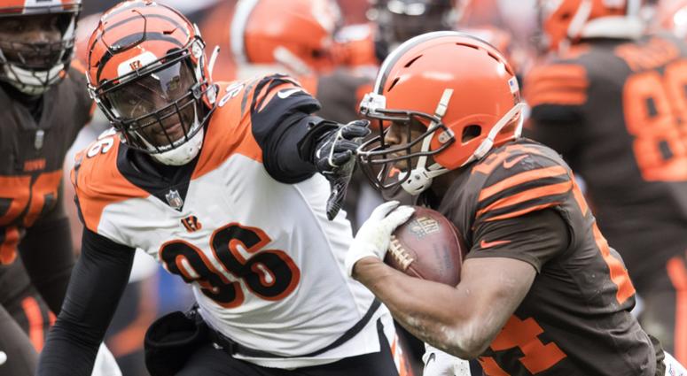 Dec 23, 2018; Cleveland, OH, USA; Cleveland Browns running back Nick Chubb (24) runs with the ball as Cincinnati Bengals defensive end Carlos Dunlap (96) goes for the tackle during the first half at FirstEnergy Stadium. Mandatory Credit: Ken Blaze-USA TOD Dec 23, 2018; Cleveland, OH, USA; Cleveland Browns running back Nick Chubb (24) runs with the ball as Cincinnati Bengals defensive end Carlos Dunlap (96) goes for the tackle during the first half at FirstEnergy Stadium. Mandatory Credit: Ken Blaze-USA TOD
