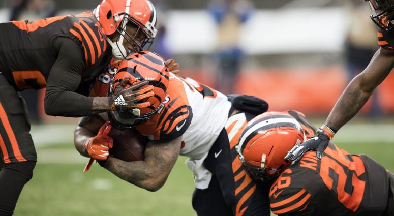 Dec 23, 2018; Cleveland, OH, USA; Cleveland Browns strong safety Damarious Randall (23) and cornerback Derrick Kindred (26) tackle Cincinnati Bengals running back Joe Mixon (28) during the second half at FirstEnergy Stadium. Mandatory Credit: Ken Blaze-US Dec 23, 2018; Cleveland, OH, USA; Cleveland Browns strong safety Damarious Randall (23) and cornerback Derrick Kindred (26) tackle Cincinnati Bengals running back Joe Mixon (28) during the second half at FirstEnergy Stadium. Mandatory Credit: Ken Blaze-US