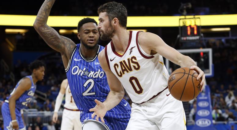 Mar 14, 2019; Orlando, FL, USA; Cleveland Cavaliers forward Kevin Love (0) drives to the basket as Orlando Magic forward Jarell Martin (2) defends during the second half at Amway Center. Mandatory Credit: Kim Klement-USA TODAY Sports Mar 14, 2019; Orlando, FL, USA; Cleveland Cavaliers forward Kevin Love (0) drives to the basket as Orlando Magic forward Jarell Martin (2) defends during the second half at Amway Center. Mandatory Credit: Kim Klement-USA TODAY Sports