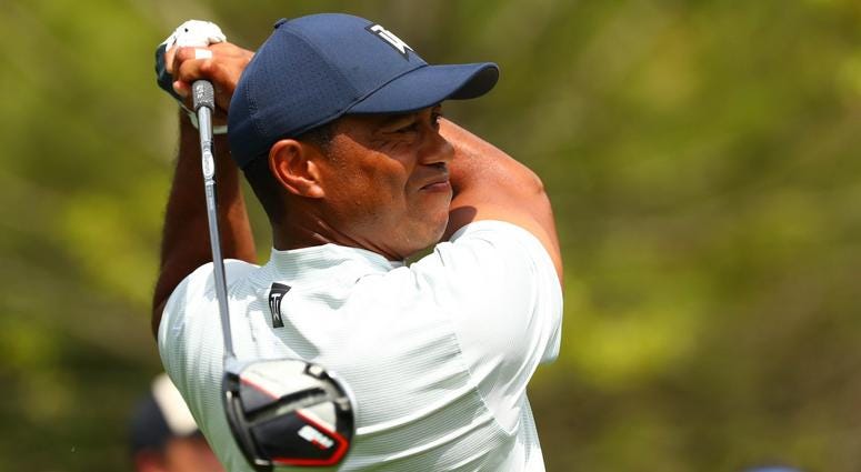 Apr 12, 2019; Augusta, GA, USA; Tiger Woods hits his tee shot on the 5th hole during the second round of The Masters golf tournament at Augusta National Golf Club. PGA: Masters Tournament - Second Round