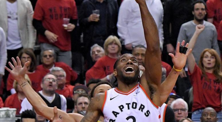 Toronto Raptors forward Kawhi Leonard (2) shoots the ball against Golden State Warriors guard Stephen Curry (30) in game two of the 2019 NBA Finals at Scotiabank Arena. Toronto Raptors forward Kawhi Leonard (2) shoots the ball against Golden State Warriors guard Stephen Curry (30) in game two of the 2019 NBA Finals at Scotiabank Arena.