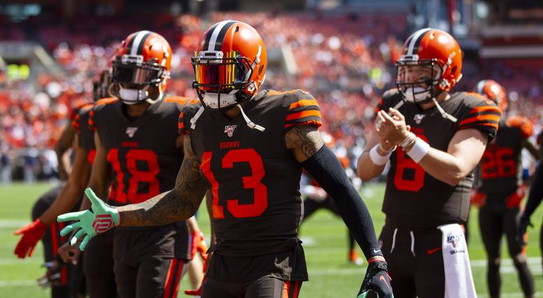 Cleveland Browns wide recievers Odell Beckham (13) and Damion Ratley (18) along with quarterback Baker Mayfield (6) welcome teammates onto the field during warmups before a game against the Tennessee Titans at FirstEnergy Stadium. Cleveland Browns wide recievers Odell Beckham (13) and Damion Ratley (18) along with quarterback Baker Mayfield (6) welcome teammates onto the field during warmups before a game against the Tennessee Titans at FirstEnergy Stadium.