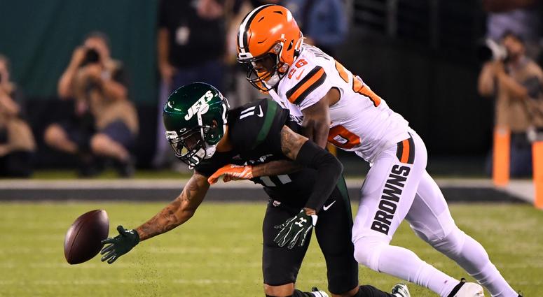 New York Jets wide receiver Robby Anderson (11) can not catch a pass while defended by Cleveland Browns cornerback Greedy Williams (26) in the first half at MetLife Stadium. New York Jets wide receiver Robby Anderson (11) can not catch a pass while defended by Cleveland Browns cornerback Greedy Williams (26) in the first half at MetLife Stadium.