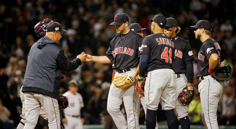 Cleveland Indians starting pitcher Aaron Civale (67) gives the ball to manager Terry Francona (77) as he is taken out of the game after giving up back to back home runs to the Chicago White Sox during the fourth inning at Guaranteed Rate Field. Cleveland Indians starting pitcher Aaron Civale (67) gives the ball to manager Terry Francona (77) as he is taken out of the game after giving up back to back home runs to the Chicago White Sox during the fourth inning at Guaranteed Rate Field.
