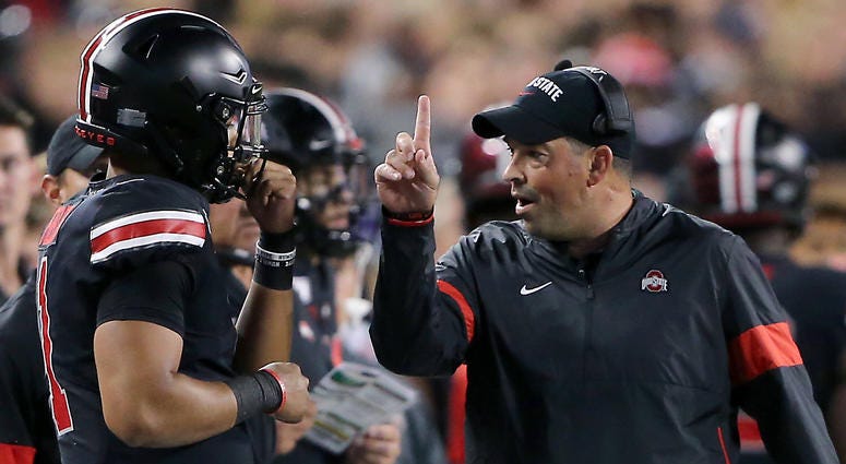 Oct 5, 2019; Columbus, OH, USA; Ohio State Buckeyes head coach Ryan Day with Buckeyes quarterback Justin Fields (1) during the first quarter against the Michigan State Spartans at Ohio Stadium. Ohio State Buckeyes head coach Ryan Day with Buckeyes quarterback Justin Fields