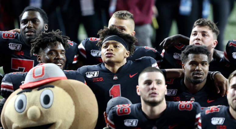 Oct 5, 2019; Columbus, OH, USA; Ohio State Buckeyes quarterback Justin Fields (1) celebrates with teammates after the game against the Michigan State Spartans at Ohio Stadium. Ohio State Buckeyes quarterback Justin Fields (1) celebrates with teammates after the game against the Michigan State Spartans at Ohio Stadium.